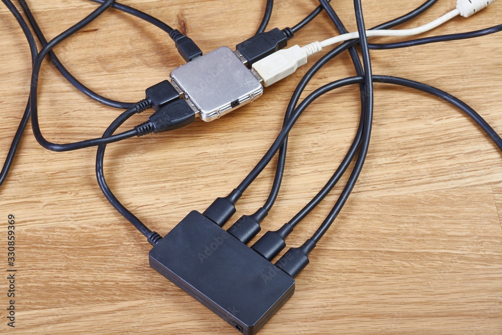 USB hubs connected to each other with many cables and devices