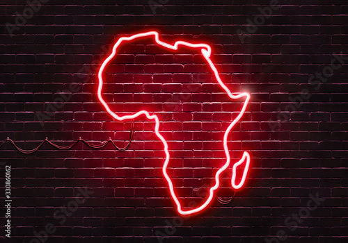 Neon sign on a brick wall in the shape of Africa.(illustration series)
