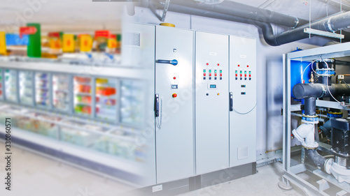 Refrigeration chamber for food storage. Industrial refrigerator at the catering facility. Equipment for cooling products. Switchboard. Cabinet to control the cooling chamber. Shelf Products