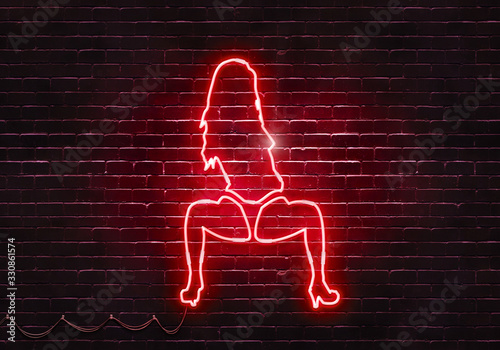 Neon sign on a brick wall in the shape of a stripper girl.(illustration series)
