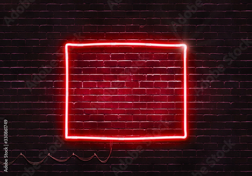 Neon sign on a brick wall in the shape of Wyoming.(illustration series)