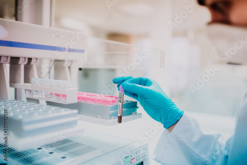 Doctor holding a positive test for covid2019, coronavirus. photo