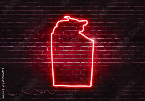 Neon sign on a brick wall in the shape of Northern Territory.(illustration series)