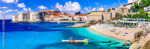 Croatia travel and landmarks - beautiful Dubrovnik town, view of old town and beach photo