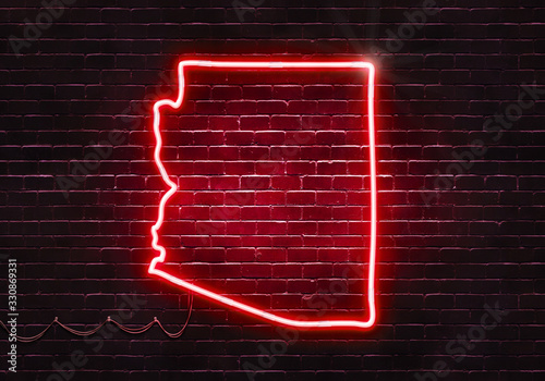 Neon sign on a brick wall in the shape of Arizona.(illustration series)