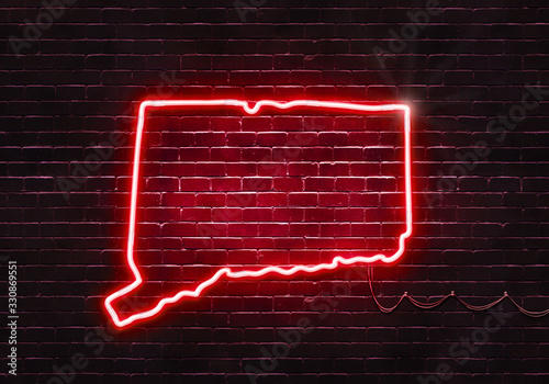 Neon sign on a brick wall in the shape of Connecticut.(illustration series)