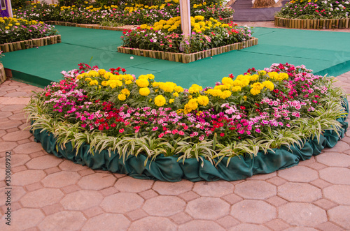 Beautiful flower gardens fences on block floor photo