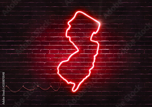 Neon sign on a brick wall in the shape of New Jersey.(illustration series)