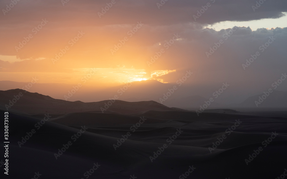 Light through Storm Sand Dunes Desert Dramatic Epic Light through Storm Sand Dunes Desert Dramatic Epic