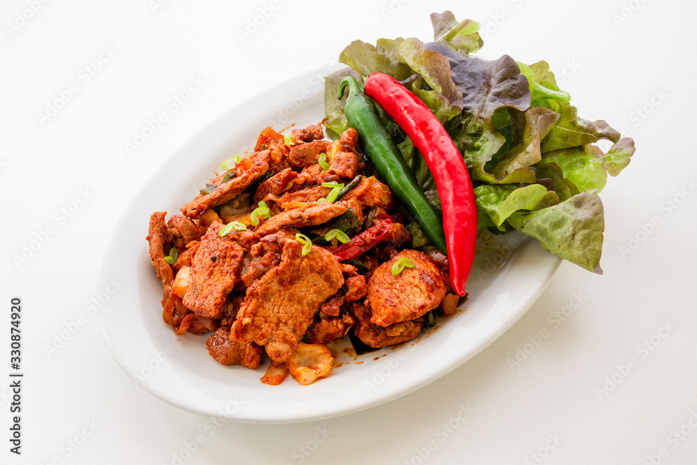 Stir fried with pork and vegetables sprinkle sesame seeds