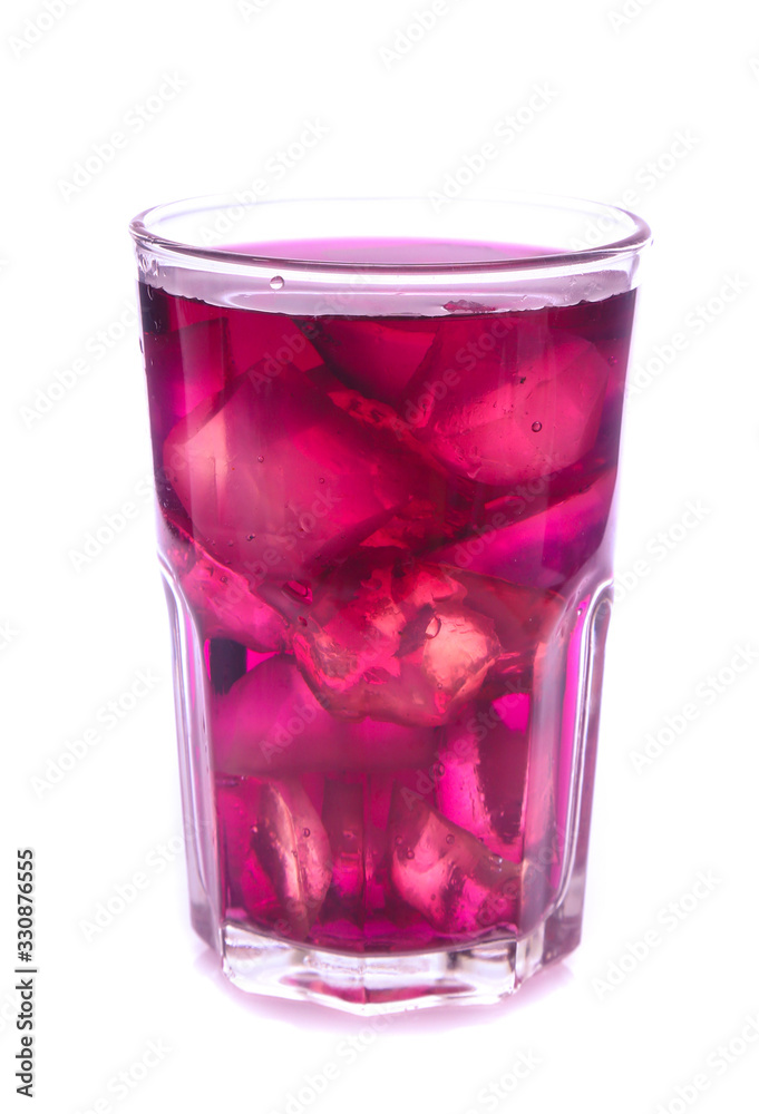 Glass of red grape juice with fruit isolated on white Glass of red grape juice with fruit isolated on white