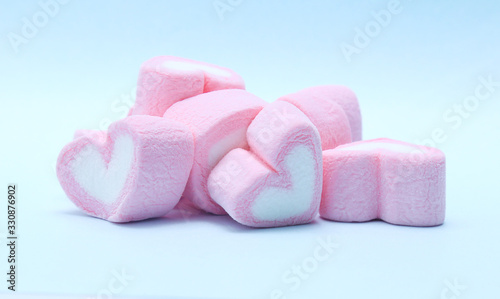 colorful marshmallows candy on blue background