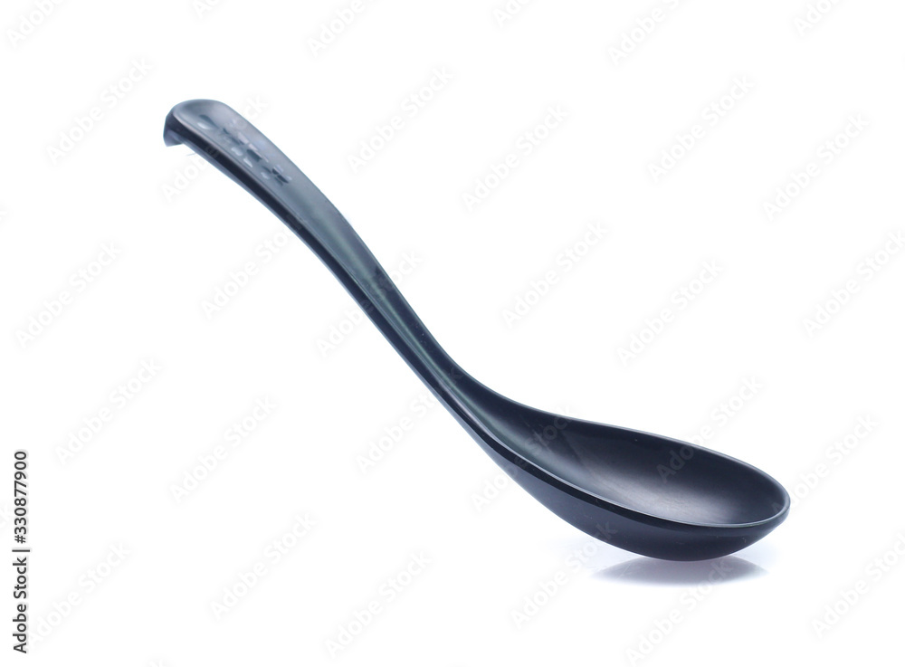 plastic black spoon, isolated on white background plastic black spoon, isolated on white background