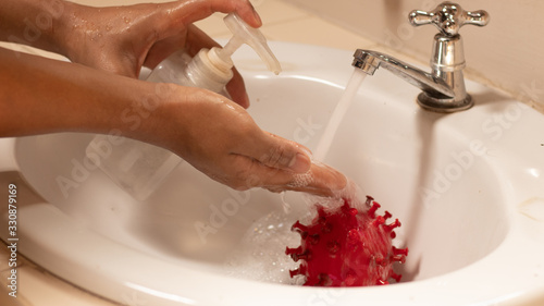 hands with clean running water and coronavirus.