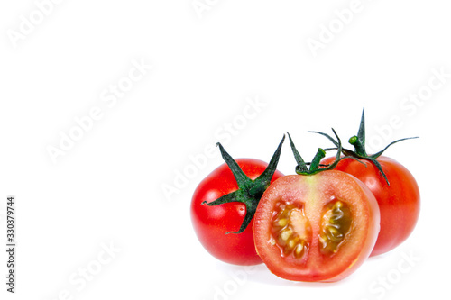 Copy space .Tomatoes isolated on white © Poramet