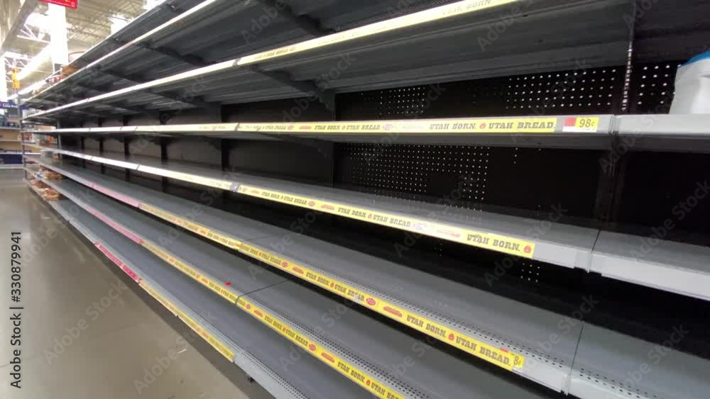 Empty shelving at a grocery store Empty shelving at a grocery store
