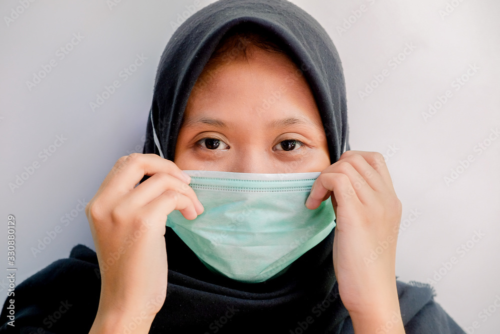 Close-up of young Asian, wearing masks. Corona Protection