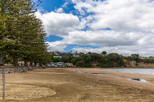 Sunny day at Browns Bay beach, Auckland, New Zealand.
