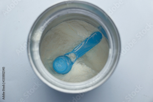 Close up of baby milk powder in a container 