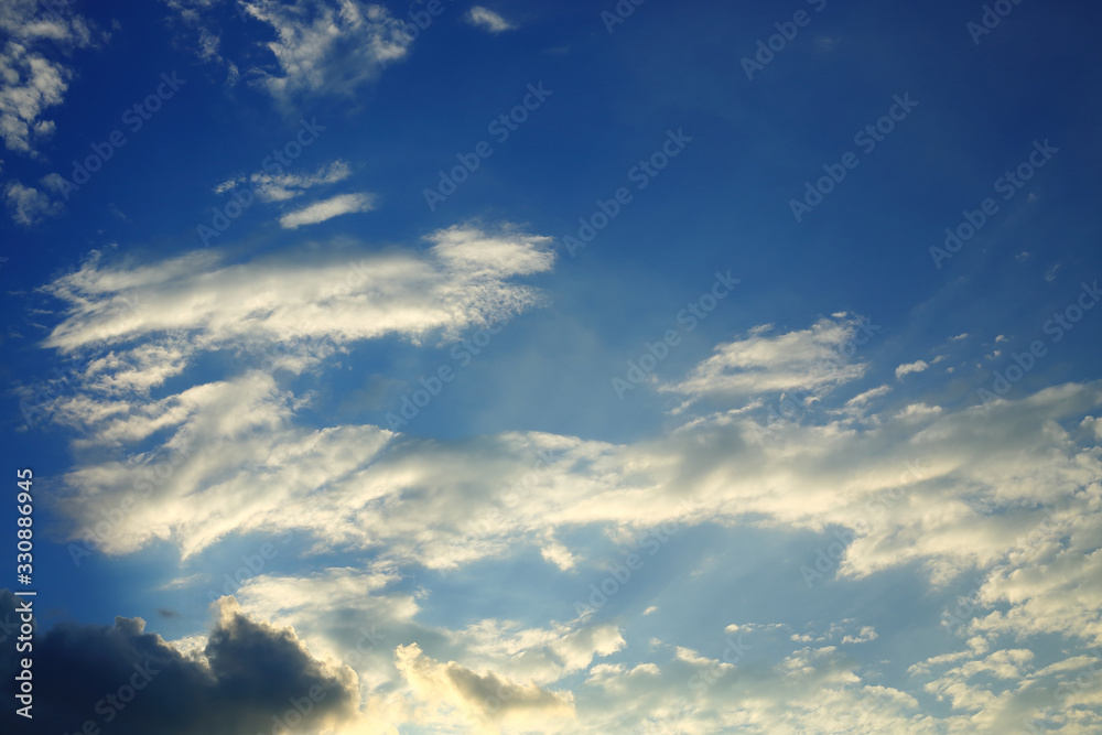 sunlight shine through cloud on dramatic blue sky background sunlight shine through cloud on dramatic blue sky background