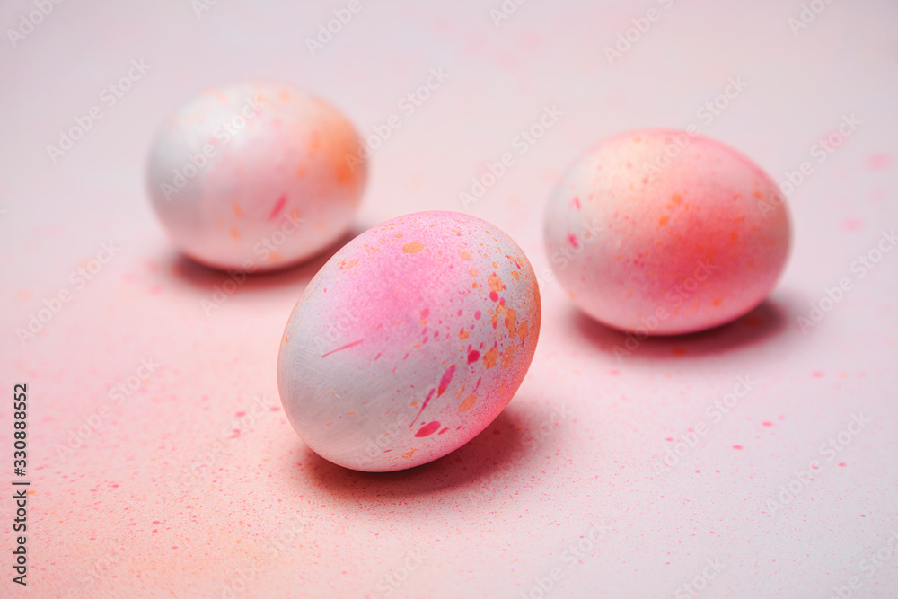 Hand painted Easter eggs on a background of multicolored pastel  - obrazy, fototapety, plakaty 