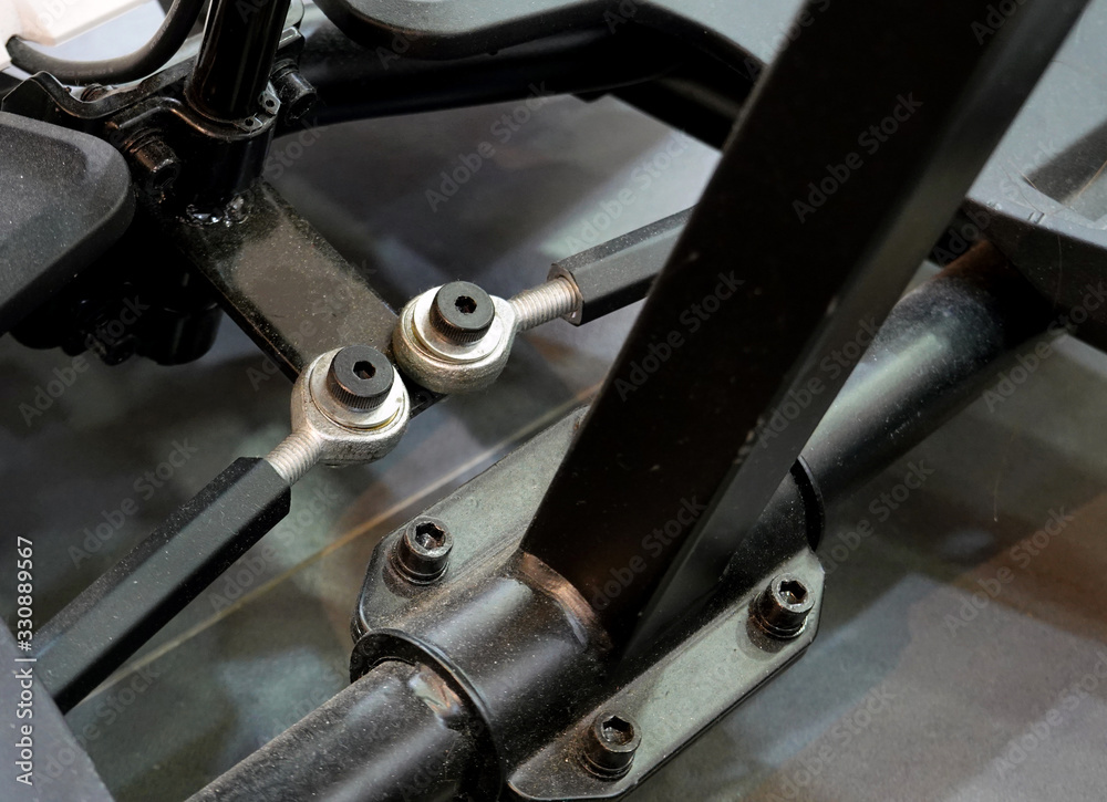 Ball joints linkage rod of ball joint and control arm a toy car. ball