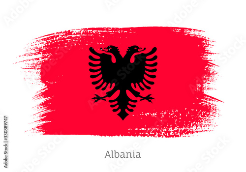 Albania official flag in shape of paintbrush stroke. Albanian national identity symbol. Grunge brush blot object isolated on white background vector illustration. Albania country patriotic stamp.