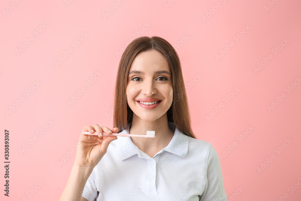 Young woman with beautiful smile and tooth brush on color background Young woman with beautiful smile and tooth brush on color background