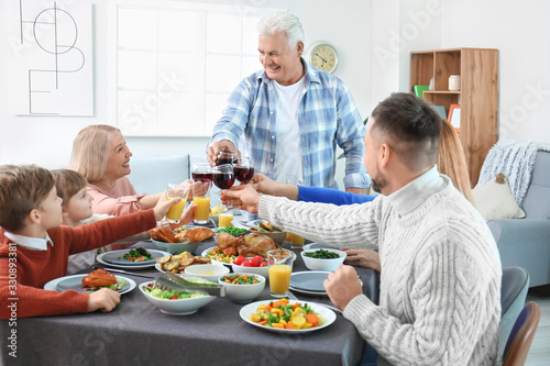 Family celebrating Thanksgi...