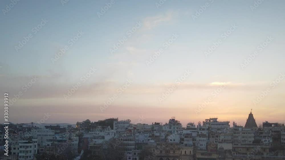 Fantastic pre sunrise hyperlapse showing the roofs and sky of an Indian city. Fantastic pre sunrise hyperlapse showing the roofs and sky of an Indian city.