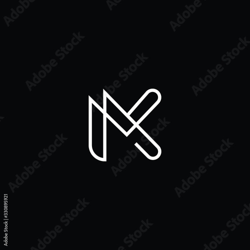 Minimal elegant monogram art logo. Outstanding professional trendy awesome artistic MK KM initial based Alphabet icon logo. Premium Business logo White color on black background