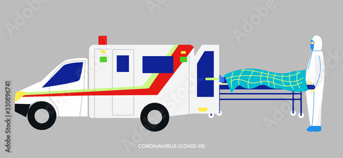 a paramedic is inserting a patient into an ambulance with a corona virus kit