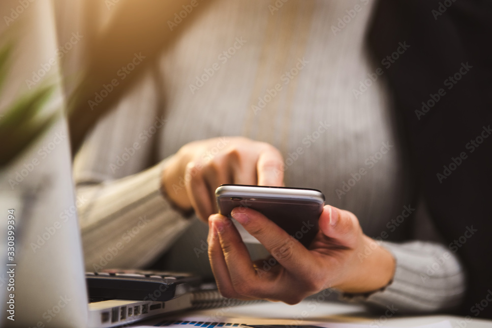 businesswoman hand working with new modern computer using on smartphone and tablet as concept businesswoman hand working with new modern computer using on smartphone and tablet as concept