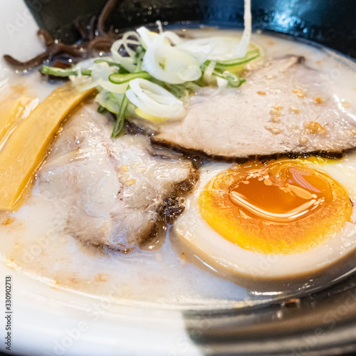 Japanese ramen with shashu pork and soft boiled egg photo