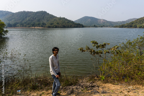 Man between nature in Jambughoda wildlife sanctuary, Gujarat  photo