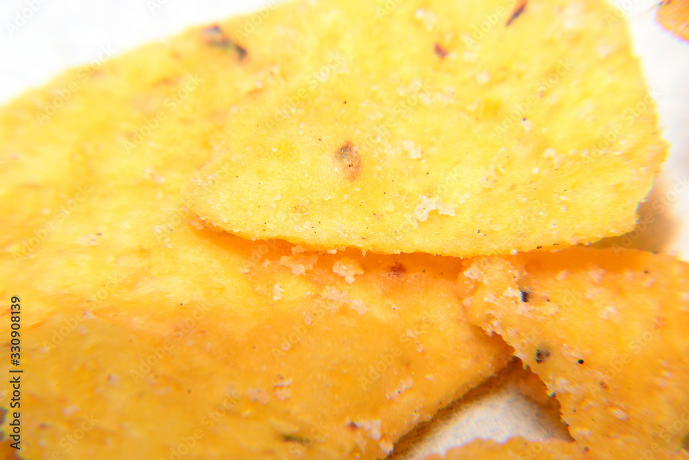 Close up of Tortilla Chips isolated with white background Close up of Tortilla Chips isolated with white background