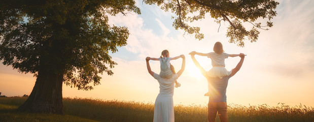 Happy family on summer walk