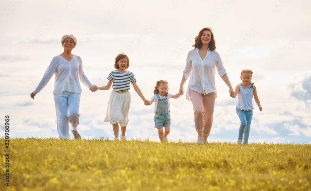 Happy family on summer walk