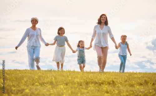 Happy family on summer walk