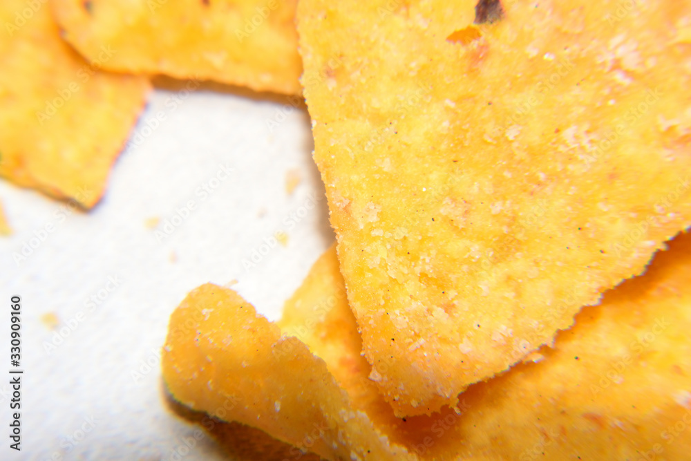 Close up of Tortilla Chips isolated with white background Close up of Tortilla Chips isolated with white background