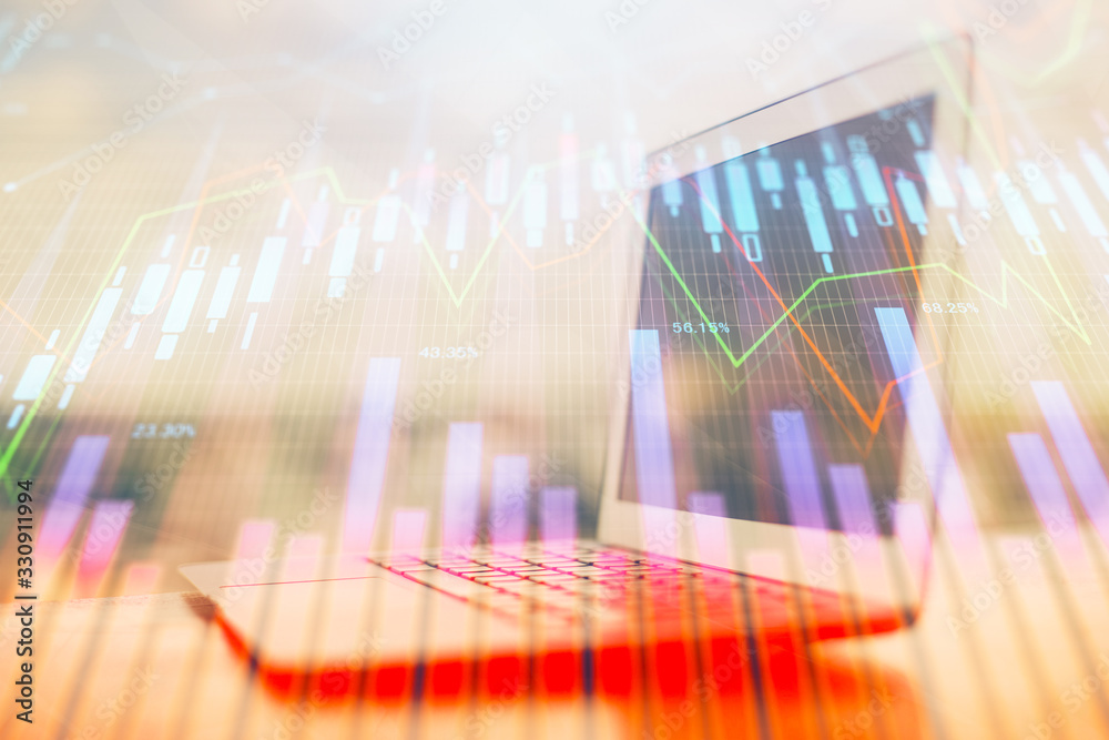 Stock market graph on background with desk and personal computer. Double exposure. Concept of financial analysis. Stock market graph on background with desk and personal computer. Double exposure. Concept of financial analysis.