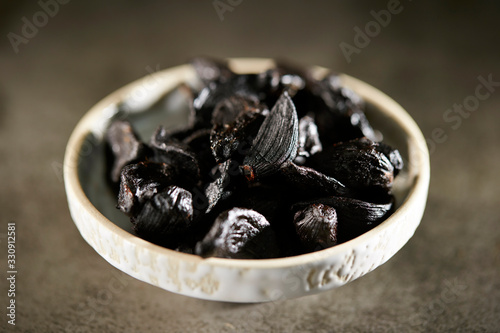Fermented black garlic