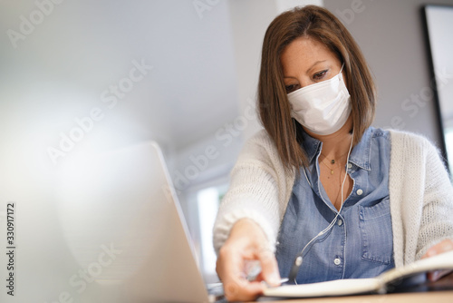 Woman working from home during coronavirus outbreak