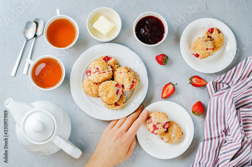 Strawberry scones with jam and butter