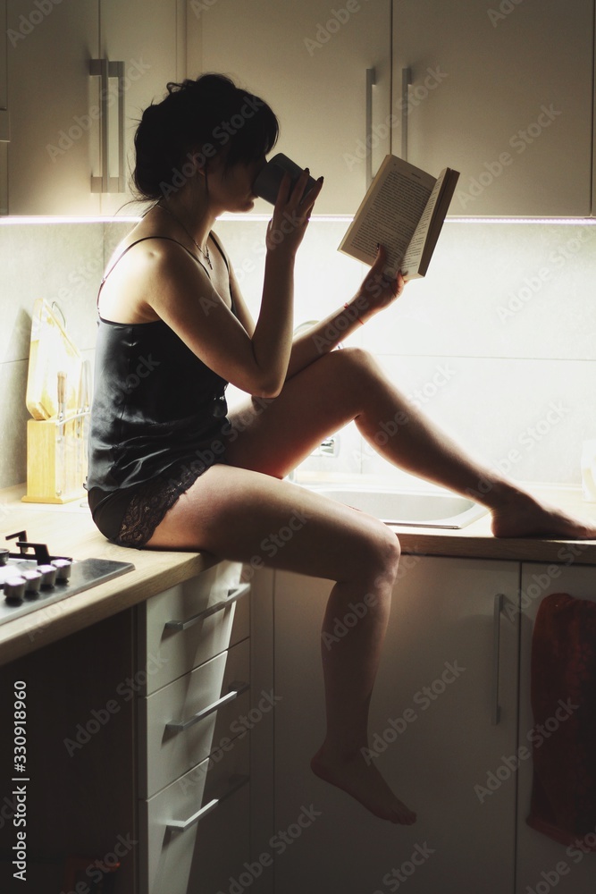 Attractive caucasian brunette girl at home, emotional portrait
