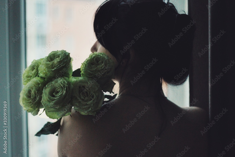 Attractive caucasian brunette girl at home, emotional portrait