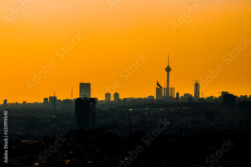 beautiful sunset over Tehran-Iran skyline at an amazing afternoon with unique clouds in the sky.