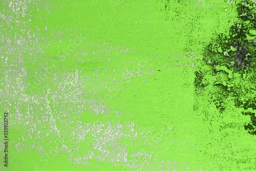 green huge holes on brushed stucco texture - nice abstract photo background