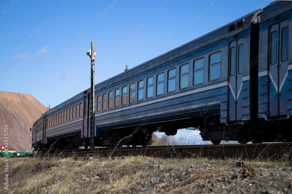 Obraz premium A commuter train moves on rails.