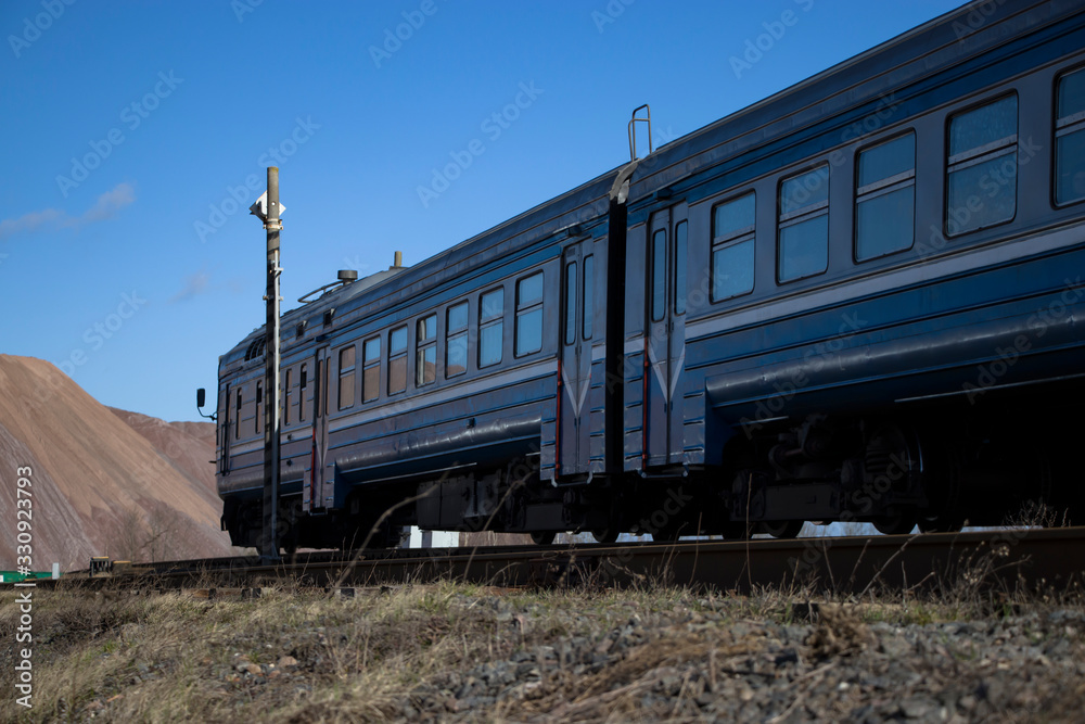 Obraz premium A commuter train moves on rails.